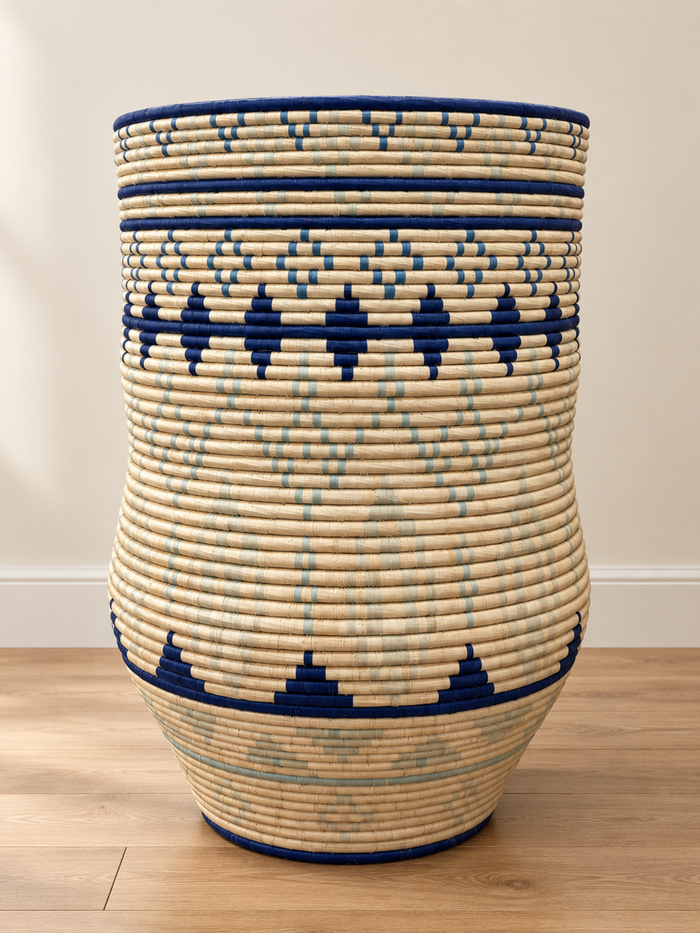 A handwoven basket standing three feet tall